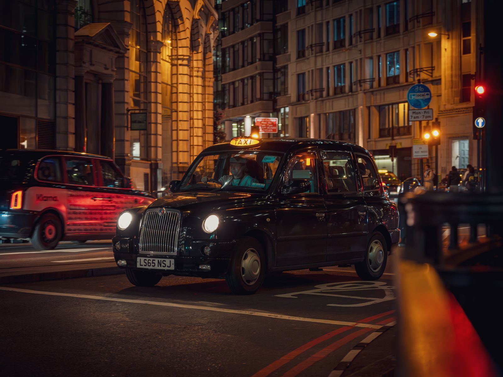 London black cab at night